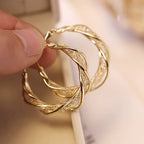 Twist Øreringe I Guld- Eller Sølvfinish | Snoet Design & Push-Back Lukning | Hverdagsbrug & Særlige Anledninger | Vanero