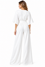 Jumpsuit I Polyester Til Dame | V-Udskæring & Brede Ben | Éndelsdesign Med Sidelommer Til Hverdag & Anledninger | Vanero