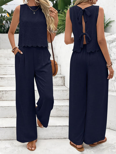Dame | afslappet jumpsuit med elegant laceindsats og bred ben stilla | vanero