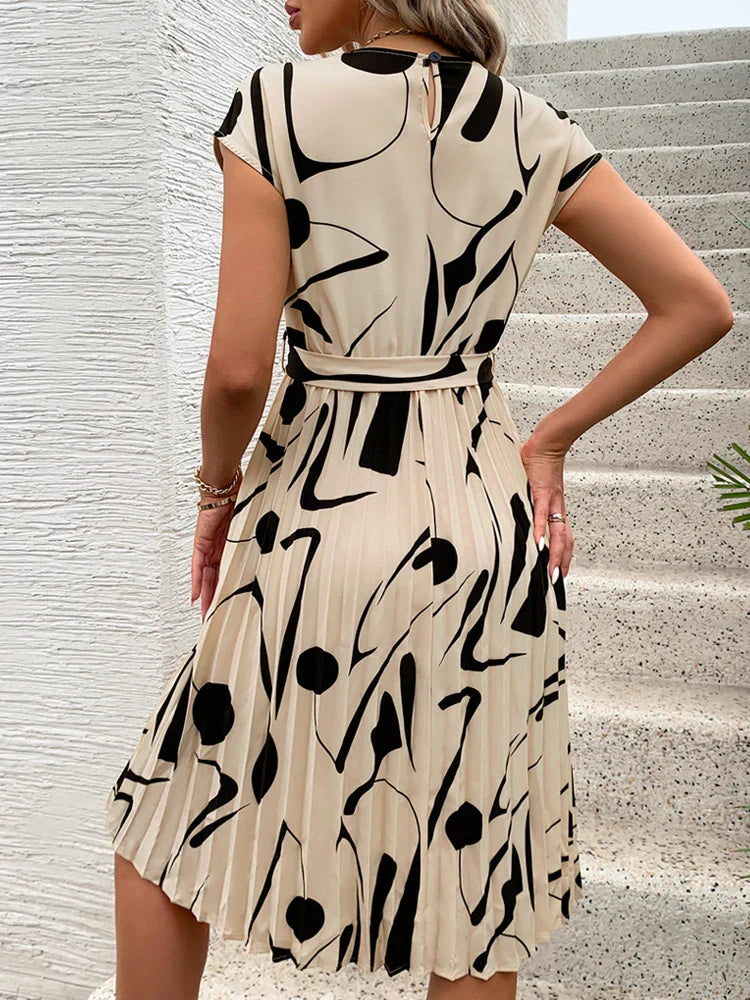 Allaine | Elegant plisseret midi-kjole med taljebånd l Vanero